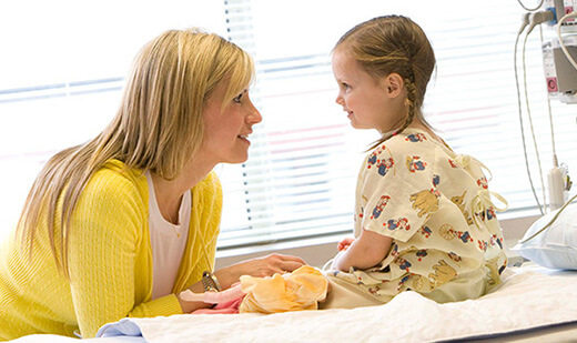 Mom with pediatric patient